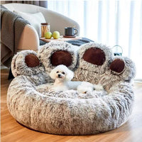 Thumbnail for Fluffy paw-shaped pet bed with a small white dog inside, in a cozy living room setting.