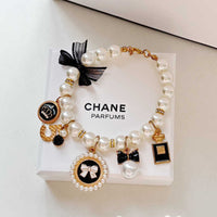Thumbnail for Black 4-PCS Pearl Charm Pet Necklace - Adjustable Bowknot Collar for Small Dogs & Cats (M: 25+5CM)