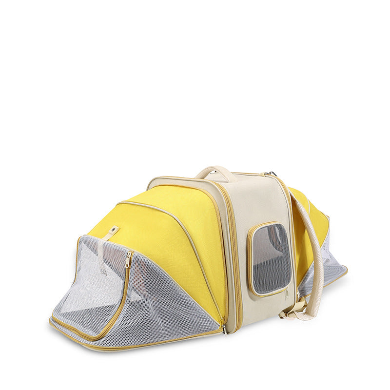 Yellow and beige pet carrier on a white background